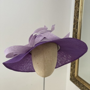 Purple wide brimmed occasion hat