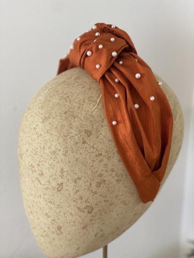 Rust orange silk knotted headband with pearls