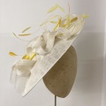 Yellow and ivory sculptural disk hat