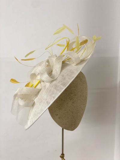 Yellow and ivory sculptural disk hat