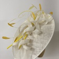 Yellow and ivory occasion hat