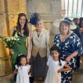 Ivory and navy mother if the groom hat