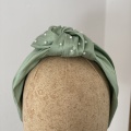 Light green silk knotted headband with pearls