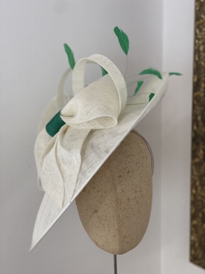 Ivory and green mother if the groom hat