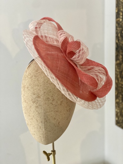 Coral disk hat for mother of the groom