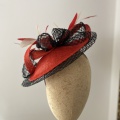 Black and red wedding guest hat