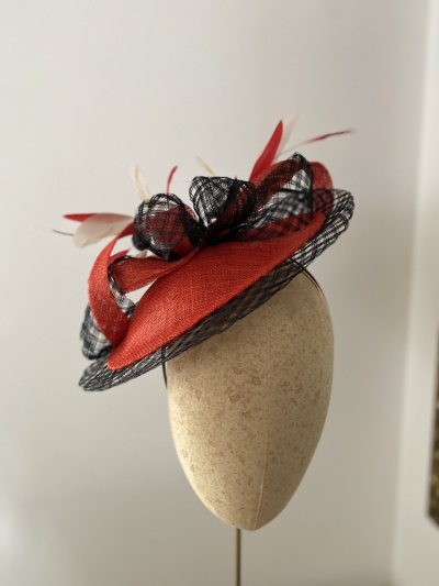 Black and red wedding guest hat