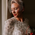 real bride wears bird cage veil.  Bailey and Mitchell Photography