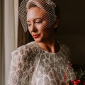 real bride wears bird cage veil