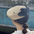 straw black bow formal hat Holly Young