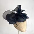 Black occasion hat with feathers