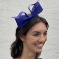 Large blue bow fascinator for wedding