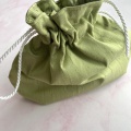 Pistachio green silk bag by Holly Young