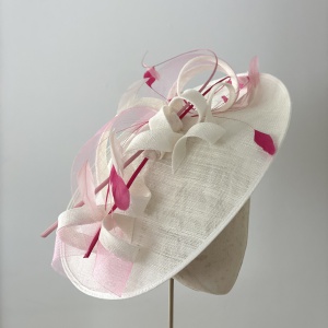 Large white and pink disk hat by Holly Young