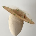 sand coloured boater with veiling