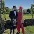 red boater hat worn with red jumpsuit