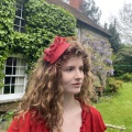 Red bow fascinator comb Holly Young