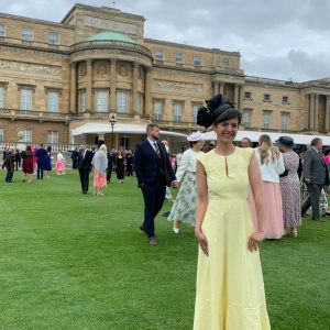 black hat worn at Buckingham palace