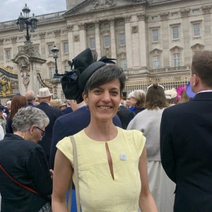 black cocktail hat worn to Buckingham palace