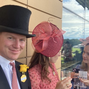 red and coral hat at royal ascot