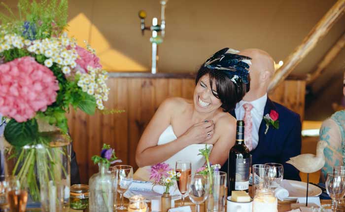 bride and groom at reception table