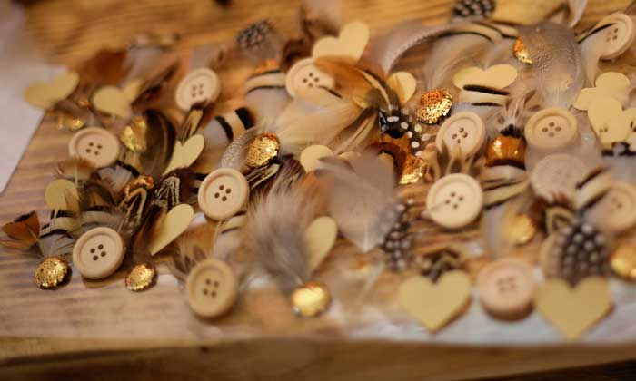 feather buttonholes woodland style